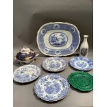 A 19th century blue and white meat dish with well, various other transfer printed plates, a green