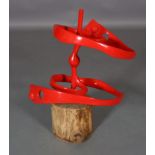 ARR Michael Benn (1937-2017), Waste Away, red enamelled aluminium sculpture of a water vortex, on