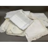 A quantity of vintage table linens