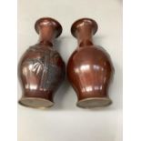 A pair of Japanese bronze vases cast with morning glory and bamboo fence 32cm high