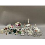 A collection of flower clusters, cherub figures, Old Country Roses miniature jug, vases,