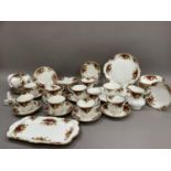 A Royal Albert Old Country Roses tea service comprising twelve cups and saucers, sugar and cream,