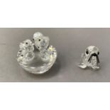 A Swarovski group of duck and three ducklings together with a Swarovski baby seal, in original