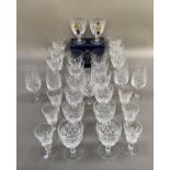 A suite of Webb Corbett handmade crystal comprising eight goblets, six small goblets, six tall