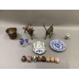 A pair of gilt metal figures of stags, an ice pail, blue and white clock, plate, onyx eggs etc