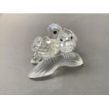 A Swarovski crystal group of lovebirds, 7cm high by approximately 9cm wide, no packaging