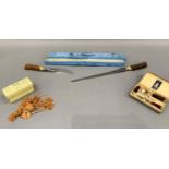 Rodgers & Sons horn handled carving knife and fork in original box, together with a Butlers of