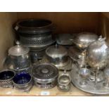 A quantity of EPNS ware including casserole stand and cover, muffin dish, egg cruet with spirit