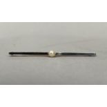 A George V pearl tie pin in 15ct gold with platinum facing and 9ct gold pin, approximate length