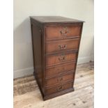 A mahogany finished three drawer filing cabinet on plinth base, 50cm wide, 64cm deep, 103cm high