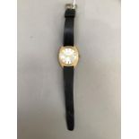 A Montine gentleman automatic date wrist watch in a tonneau textured, rolled gold case c.1975