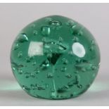 A 19th century green glass dump of spherical outline the mushroom centre within a surround of