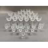Part suite of cut glass by Edinburgh Crystal, Scotland, comprising 10 champagne flutes, 12 small