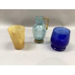 A Victorian amber and pale blue glass jug, the square body dimpled to each side and frosted with a