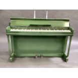 An Art Deco Minx mini piano in green, registered no.5809841509841, approximately 133cm wide