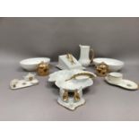 White and gilt table ware including two oval serving dishes, cheese dish and cover, jug, triple hors