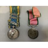 A silver Turkish Crimea medal (medal has been drilled and plugged) and a silver Crimean medal with