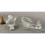 A Swarovski crystal sleigh with Christmas tree and presents in original packaging