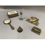 A white metal figure of a ballerina on oval base, a gilt metal evening bag, stamp box, bell, hand