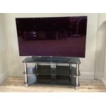 An LG OLED curve screen television, model number 55C6V, screen size 140cm (55 inch) together with