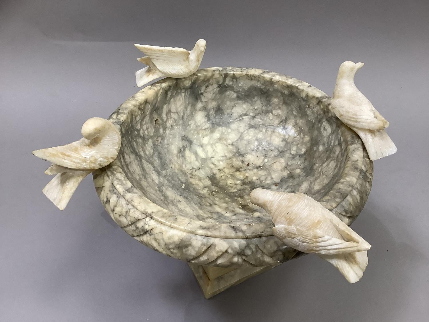 A pedestal bowl with Pliny doves perched on the rim, alabaster, approximately 31cm diameter by - Image 2 of 2