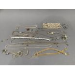 A small collection of mid to late 20th century costume jewellery including necklaces, brooches and