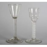 A Mid 18th century English wine glass, ogee bowl on a double opaque twist stem conical foot with