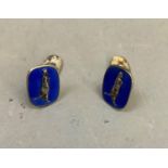 A pair of silver and blue basse taille enamel cufflinks by David Andersen, the cameo effect full