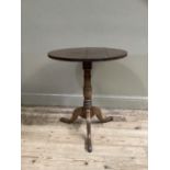 A 19th century oak tripod table, circular, on vase turned column and pad feet, 62cm