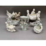 Various ceramic vases and baskets, including carriage drawn by two cherubs, pair of cherubs in