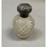An Edwardian VII silver lidded cut glass scent bottle, Birmingham 1903, 12.5cm high