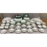 An extensive Minton Haddon Hall tea and dinner service comprising ten tea cups, fourteen saucers,