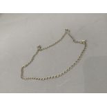 A silver neckchain in faceted curb links, approximate length 60cm, approximate weight 220g