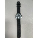 A 1960's French navy style wrist watch in chromed case, quartz movement, black dial white batons and