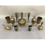 A collection of Benares brass including pair of knopped and tapered vases, a pair of pedestal cups