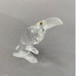 A Swarovski crystal toucan in original packaging