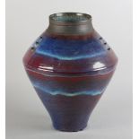 ARR Peter Sparrey (b.1967) Stone ware vase, sang de boeuf glaze, approximate 38cm high