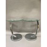 A pair of chrome and glass occasional tables, 45cm diameter x 55cm high