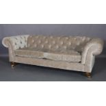 A Delcor Bespoke oyster velvet Chesterfield sofa, on turned front legs with castors, 240cm wide x