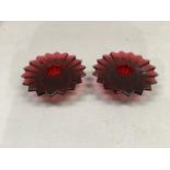 A pair of Baccarat France ruby glass candle holders in the form of stylised flowerheads, signed, 9.