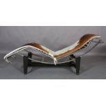 After Le Corbusier an LC4 style chaise, chrome tubular frame with cowhide upholstery