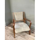 A 1930s/1940s laminated bentwood framed armchair with beige corduroy upholstered back and seat