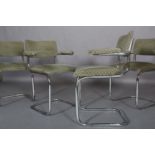 A set of four Modernist style cantilever open armchairs, chrome tubular frames with upholstered back