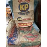 A collection of 15 hessian sacks consisting of 11 branded 'Selected KP Saturna Seed Agriculture