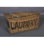 A wicker laundry basket, 78cm x 54cm