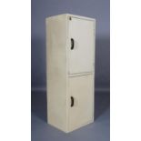 A Jalray cream finished metal cabinet c.1950 of two doors with black curved handles, 51cm wide x