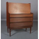 A 1970s mahogany bureau having a drop front, the interior fitted with two drawers and pigeon