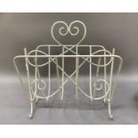 A late 1960s white wire work magazine rack, 37cm wide