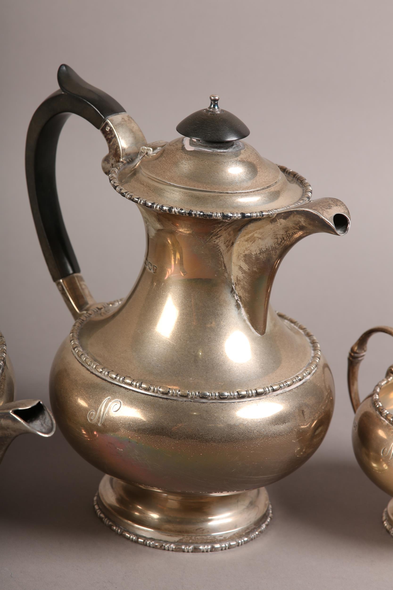 A GEORGE V FOUR PIECE SILVER TEA SERVICE, Walker & Hall, Sheffield 1934, comprising teapot, hot - Image 3 of 5