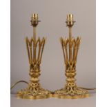 A PAIR OF MID 19TH CENTURY GILT METAL VASE SLEEVES, as lamps, of Gothic Revival design, pierced with